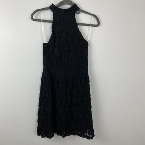Mystic, Black stretchy lace sleeveless chocker style dress.